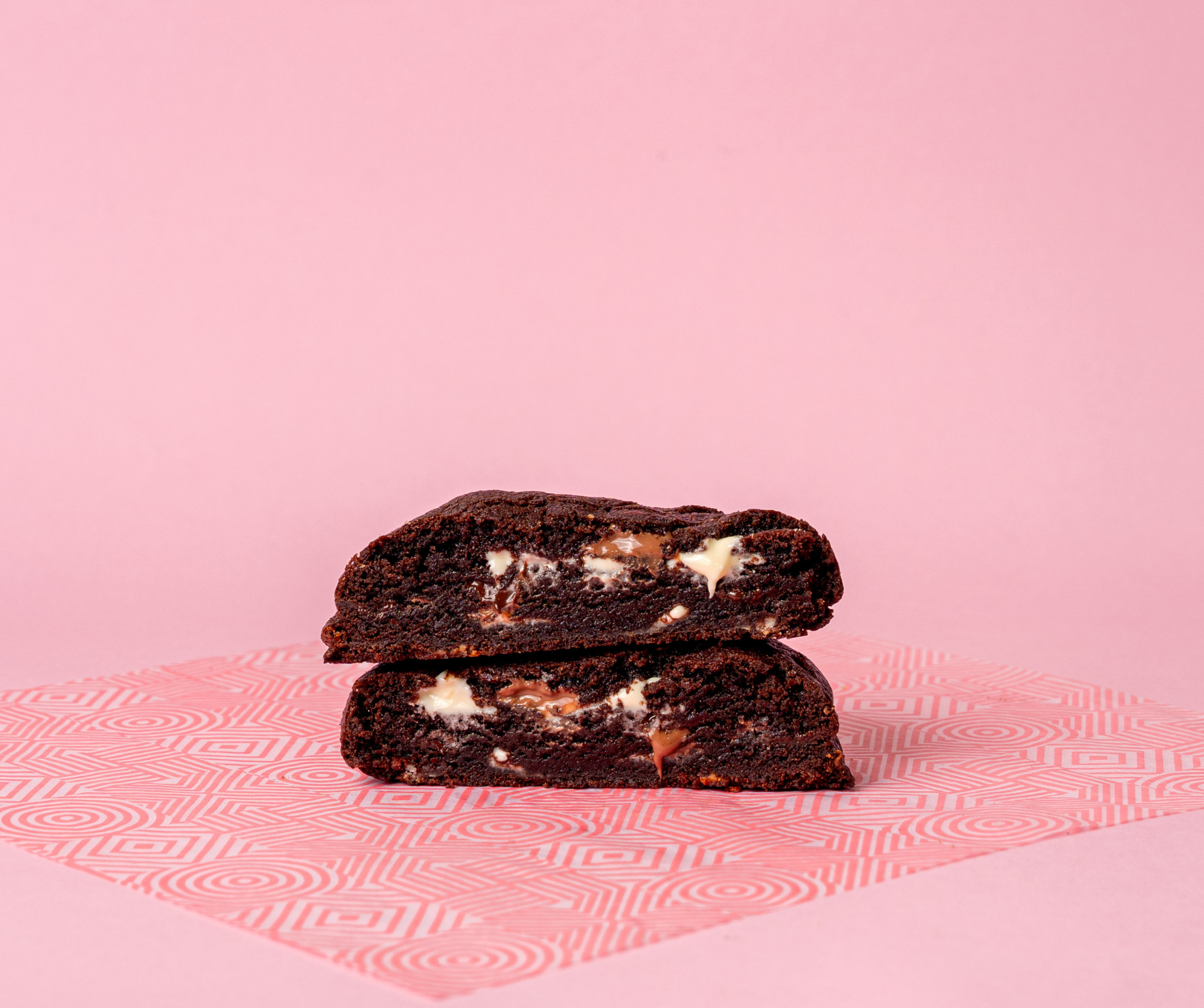Loaded chocolate chip cookie close-up showing melted chocolate centre