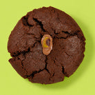 The Dubai Cookie by Coco Lane, dark chocolate with a milk chocolate dollop and a pistachio on top
