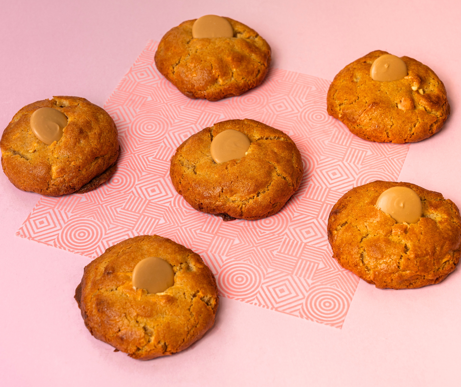 Six chunky chocolate cookies — Triple Choc, OG Choc Chip, Caramel, Kit Kat, M&M, Coconut Rough
