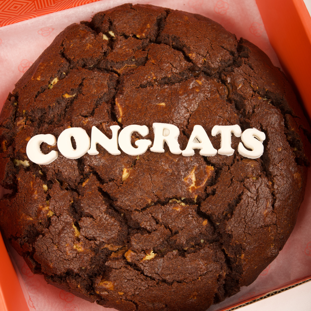 1kg Coco Lane cookie sliced showing gooey chocolate-loaded interior