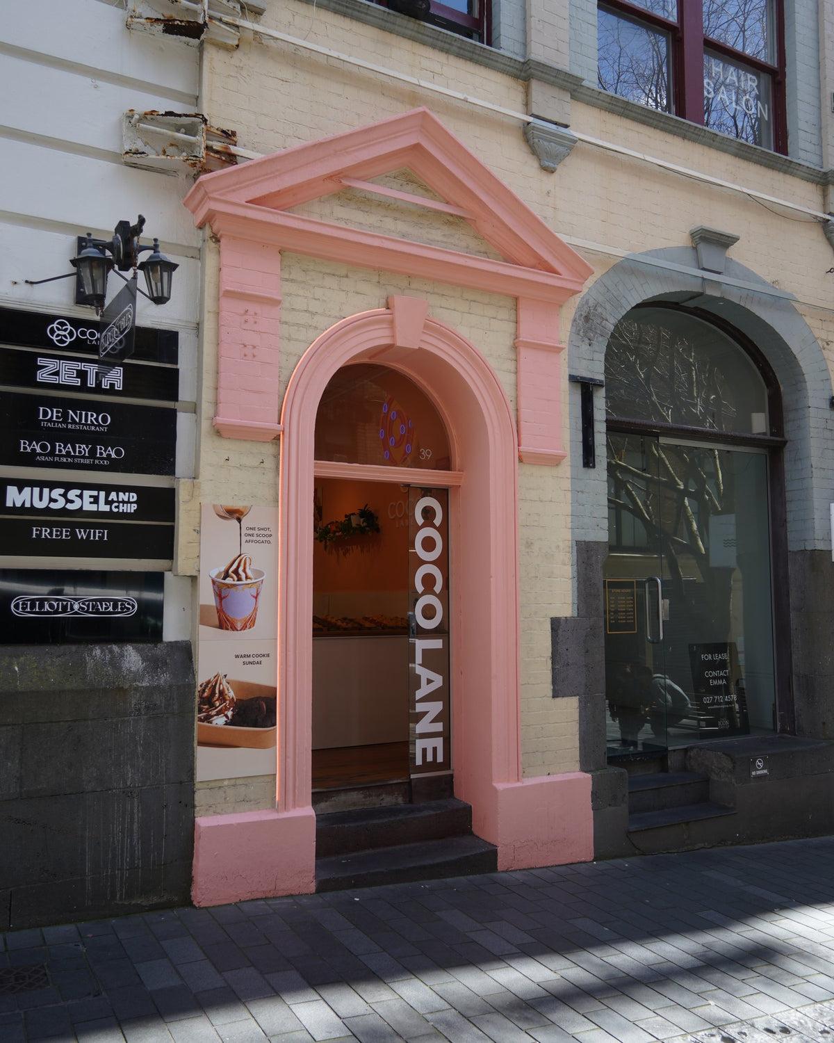 The pink Coco Lane doorway on High Street, Auckland