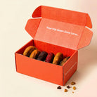 The Six Pack — six loaded cookies in the Coco Lane box, studio shot